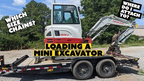 securing a compact excavator on a trailer|mini ex trailer loading instructions.